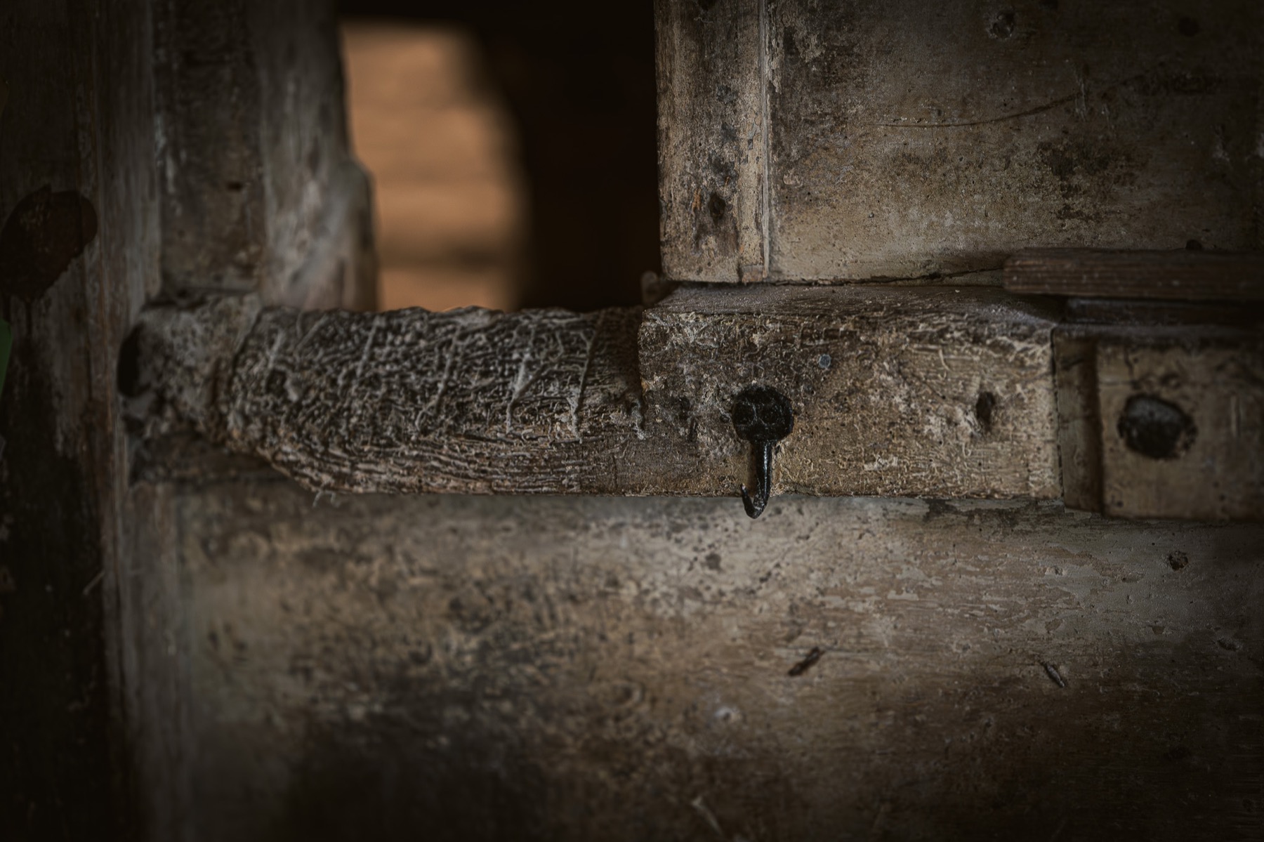 Worn wood and working surfaces inside Cogglesford Mill.