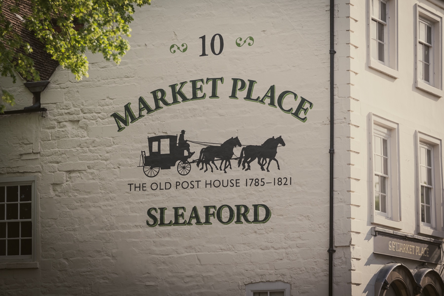 Sleaford Market Place civic surface and surrounding buildings.