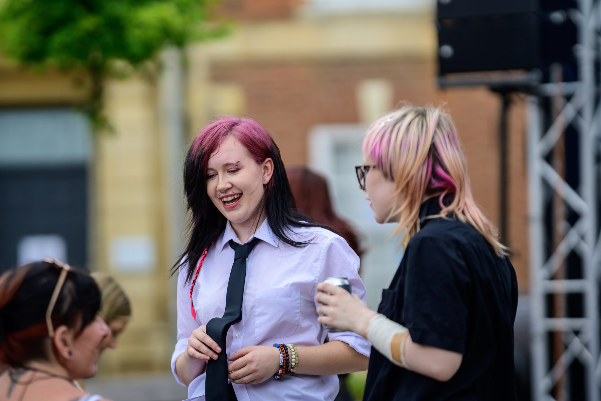 Two performers near the stage