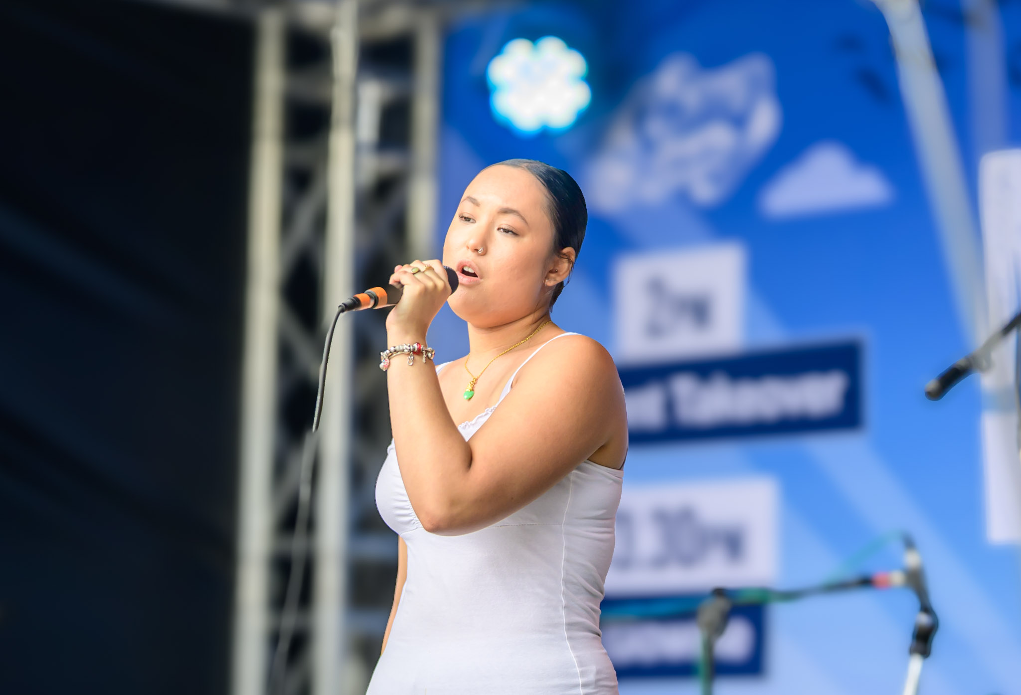 Singer performing on the Sleaford Midsummer Festival stage