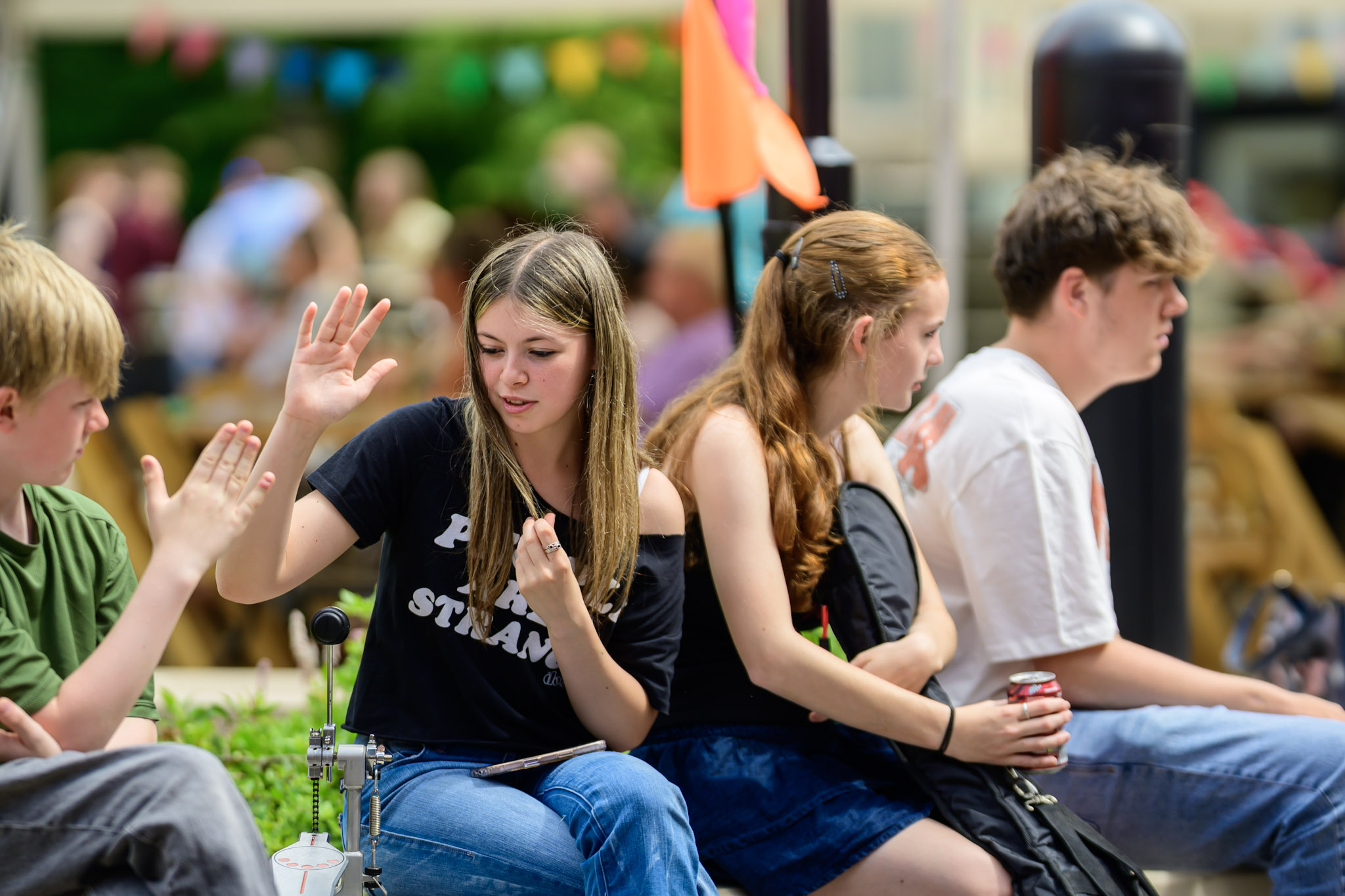 Young people sitting together during Sleaford Midsummer Festival
